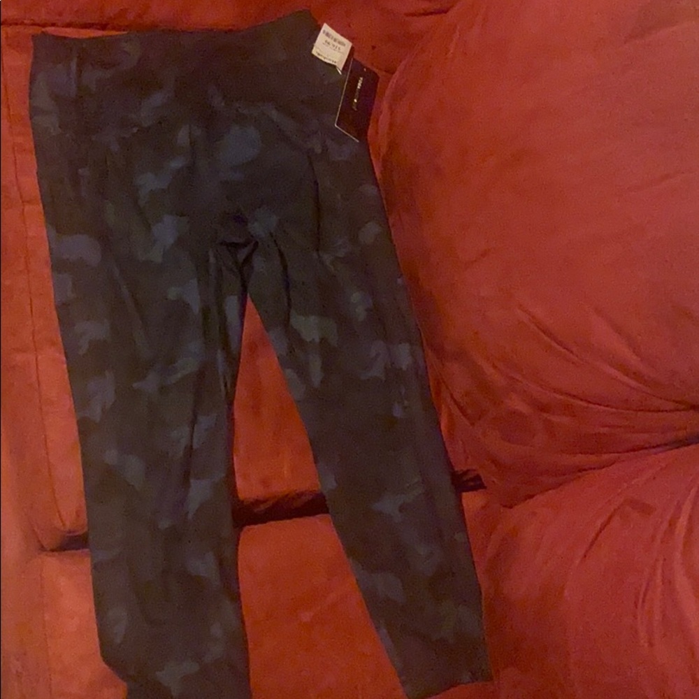 A pair of army fatigue leggings